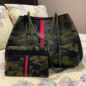 GREYSON SOHO NEOPRENE TOTE by Haute Shore. Green camo/ olive/black/red stripe
